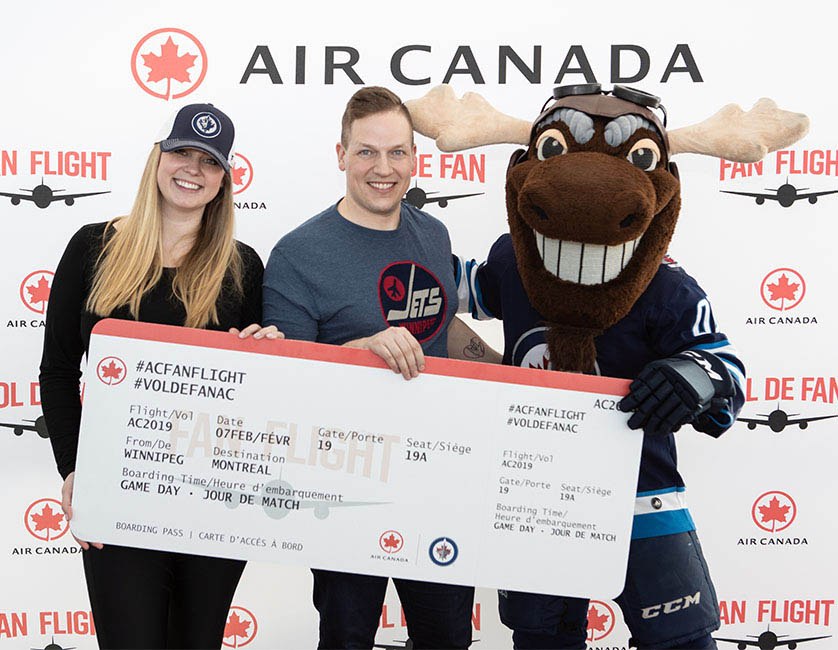 Fans interating with Mascot.